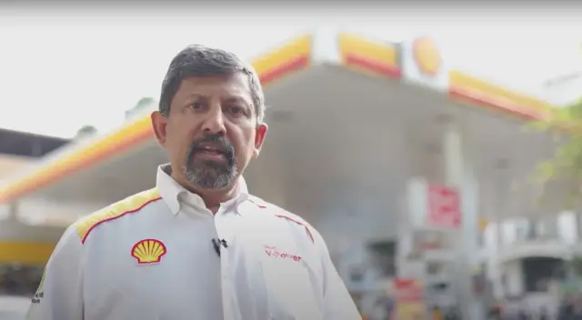 Shell employee filmed at a petrol station for the awards documentary